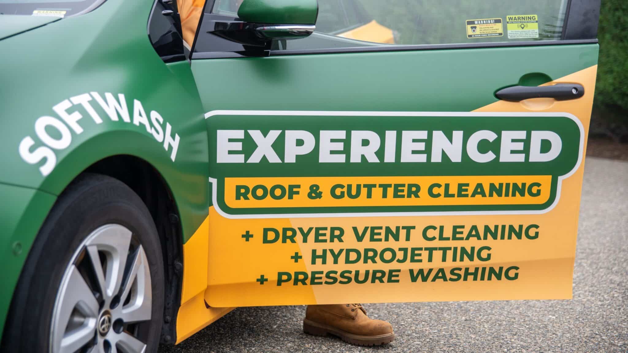 close up look of a car door for experienced roof and gutter cleaning